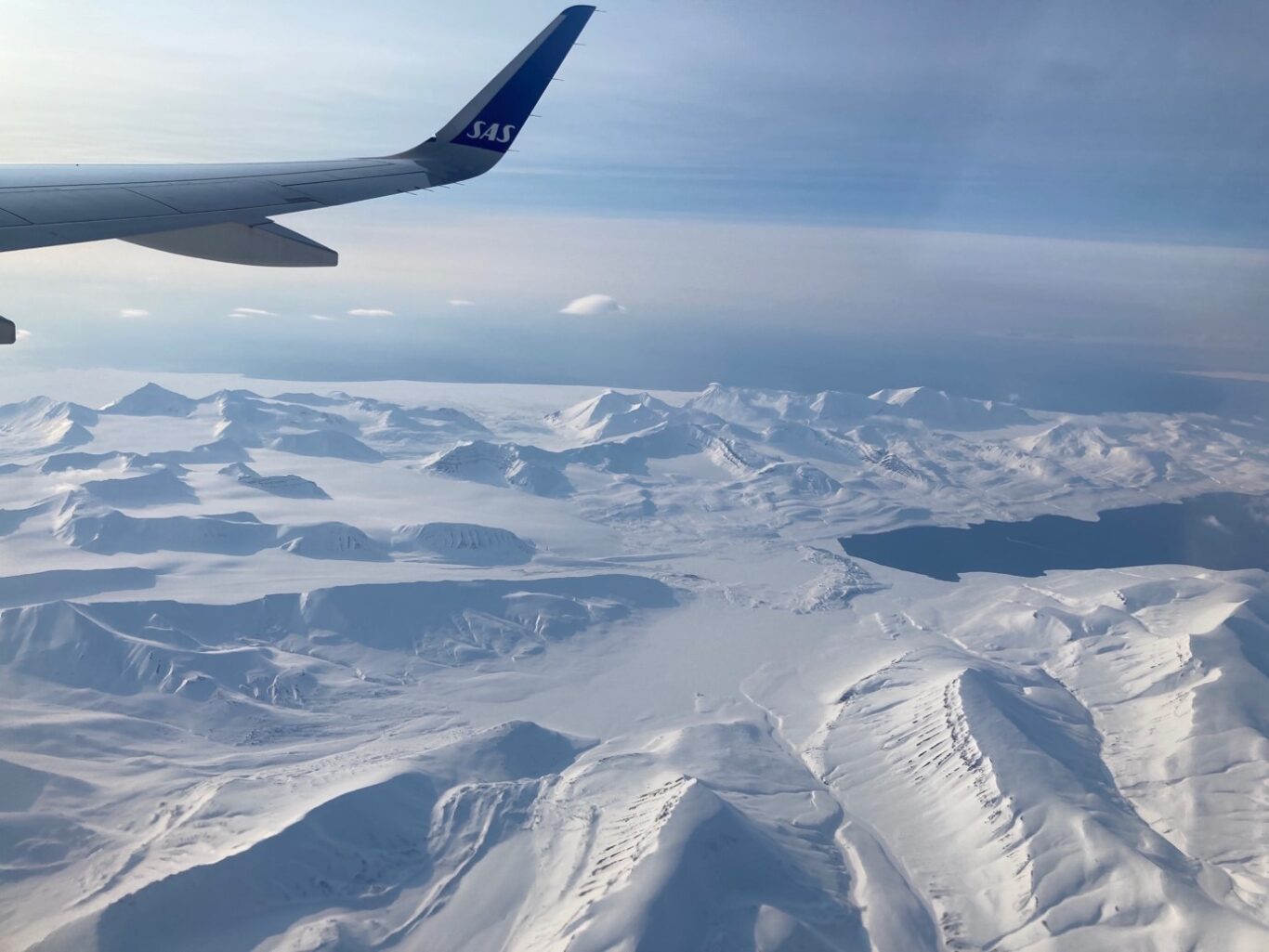 The vast Arctic landscape of Svalbard attracts people from all over the world to visit and live in Longyearbyen. Most arrive by plane. Photo by Alexandra Meyer.